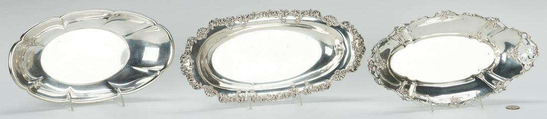 3 Assorted Sterling Bread Trays: 3 assorted sterling silver bread trays, including Gorham. 1st item: Oval bread tray with scalloped and pierced rim with floral decoration, marked GORHAM STERLING A2568, 12 1/2" L. 2nd item: Oval bread