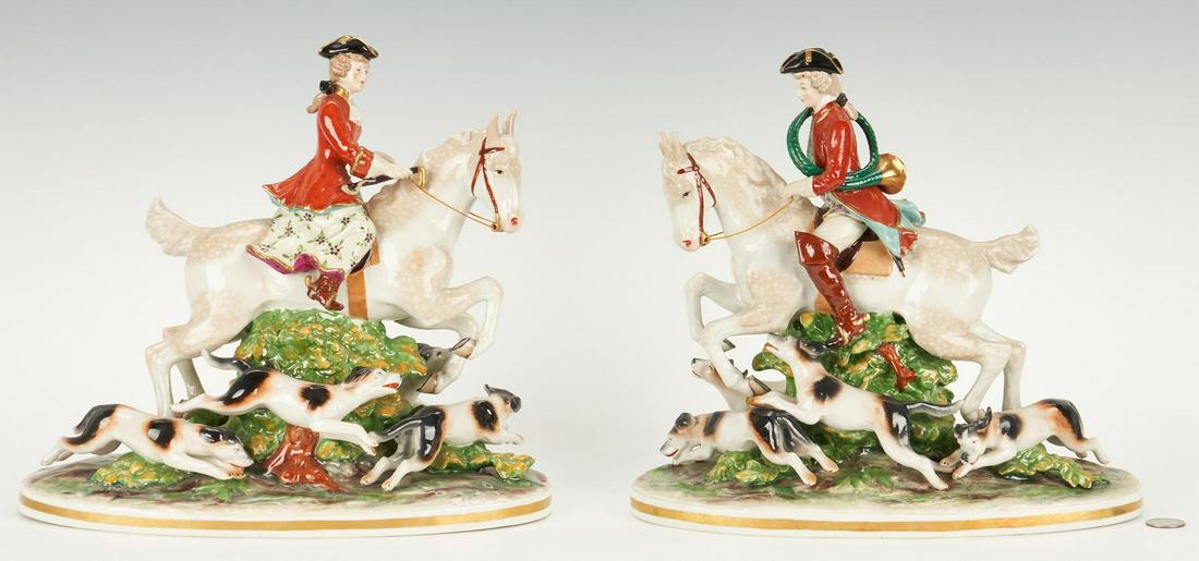 2 Capodimonte Hunt Scene Figurals: Two (2) Capodimonte fox hunting themed porcelain figural groups, each with a male or female figure on horseback surrounded by hounds. Capodimonte "N" mark to ground. Each - 11 3/4" H x 13" W x 6 1/2"