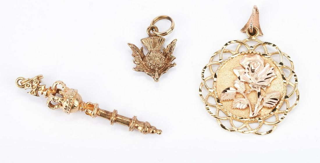 3 Ladies Gold Pendants, Scepter, Rose & Thistle: 1st item: Ladies 9K yellow gold scepter pendant. The pendant is marked "375" and is 1 3/4" H. The gross weight of the pendant is 3.33 grams. 2nd item: Ladies 14K yellow and rose gold pendant featuring