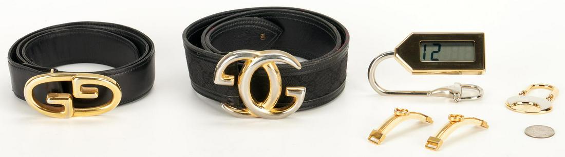 8 Gucci items, incl. belts, promotional items: Eight (8) Gucci items, including two (2) mens belts, Centennial 1881-1981 promotional keychain. 1st item: Men's black logo canvas and leather belt with gold tone Gucci logo belt buckle. "GUCCI ITALY"