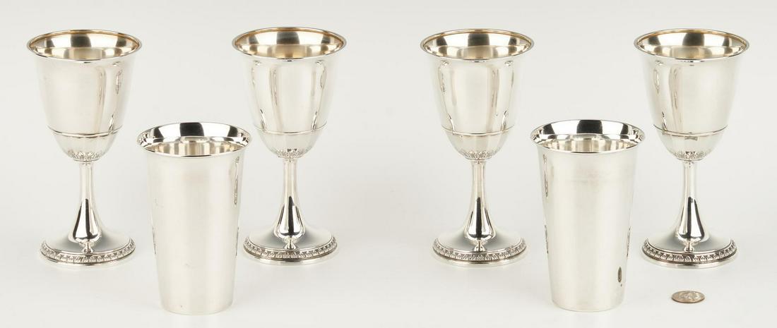 4 Sterling Silver Goblets and 2 tall beakers: 1st through 4th items: 4 Gorham / Durgin goblets in the Princess Patricia pattern with flared rims and gilt washed interior bowls, the lower section of bowl with faceted exterior and chased acanthus e