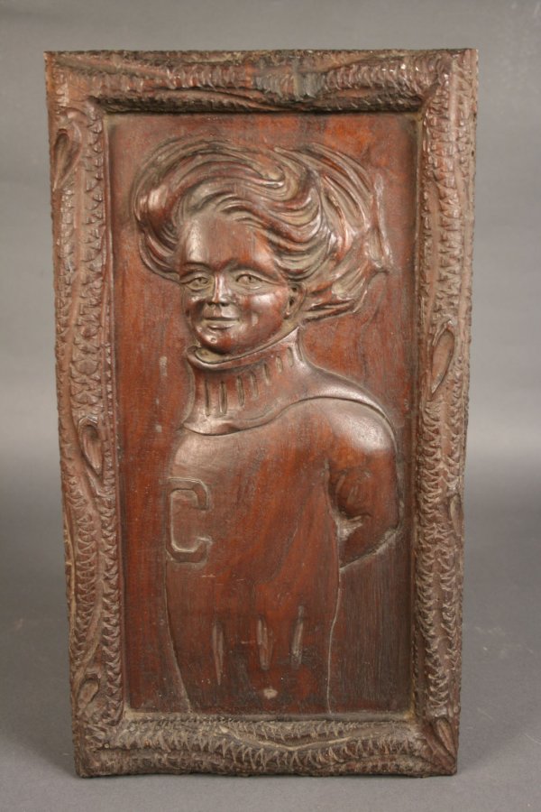 Carving of woman in sweater