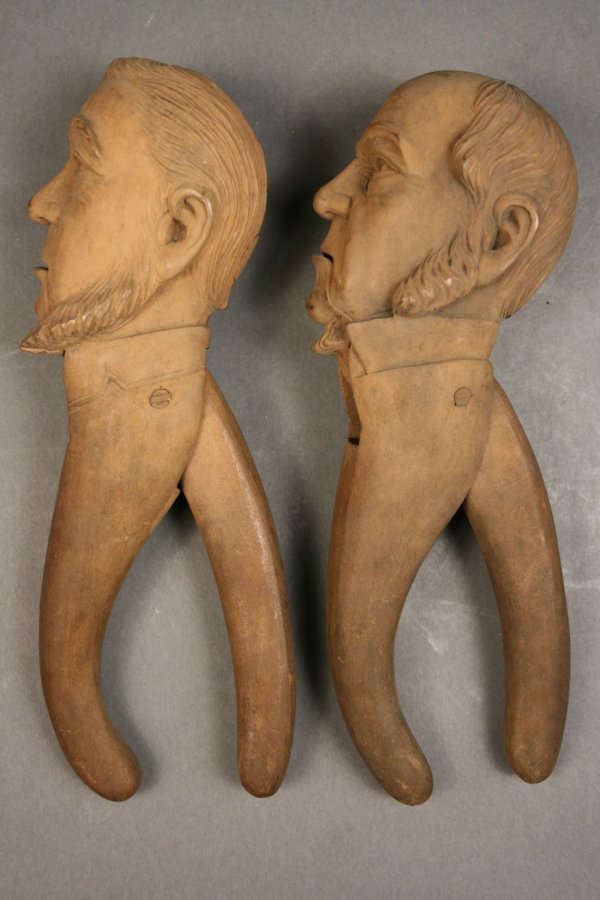 Carved folk art nutcrackers depicting man face - 3
