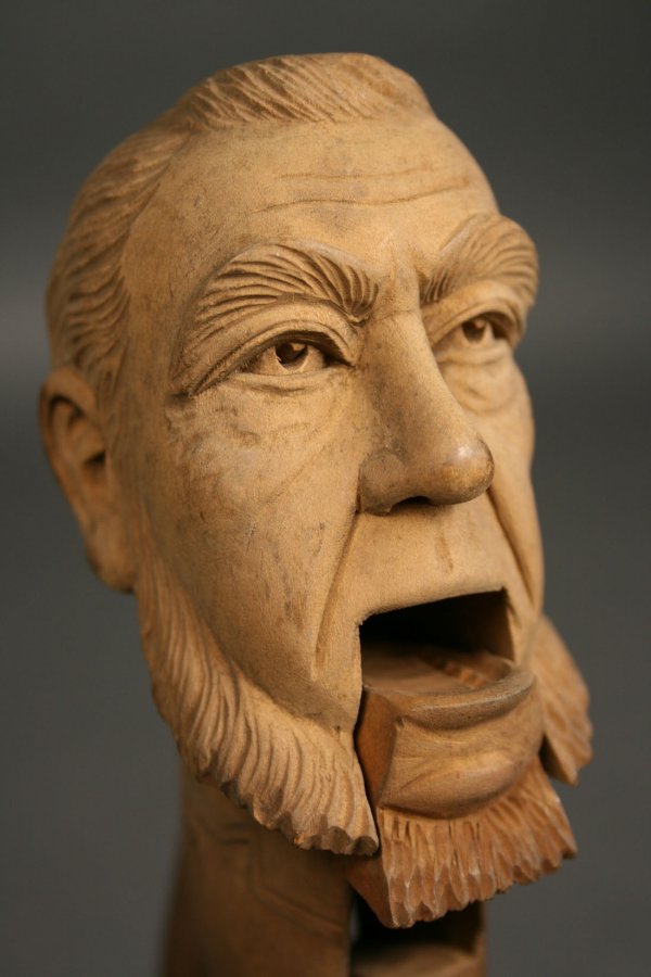 Carved folk art nutcrackers depicting man face - 7