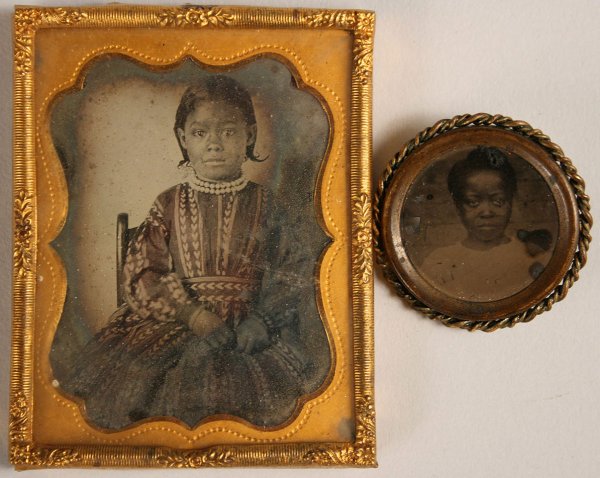 Ambrotype & Tintype of young black children: Ambrotype & tintype of young black female children. 1st item - Ambrotype of young black girl seated in chair in gold metal frame. Some discoloration to perimeter of photo, scrapes to back of image. 2