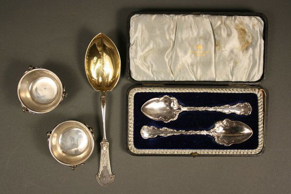 Gorham sterling and Glasgow silverplated spoons: Grouping of 19th century Gorham silver and Glasgow silverplated spoons. Two early coin silver salt cellars or salt dips, tapered round shape with mythological winged griffin supports, Lion Anchor G ma