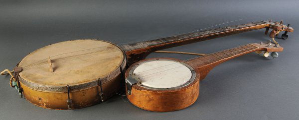 Grouping of banjos, found in Anderson Co., TN: Lot of two folk art items. 1st item - Small birdseye maple 4 string banjo found in Anderson Co., Tennessee. Two strings missing and two replaced keys. Hairline crack & small area of wood loss to reson