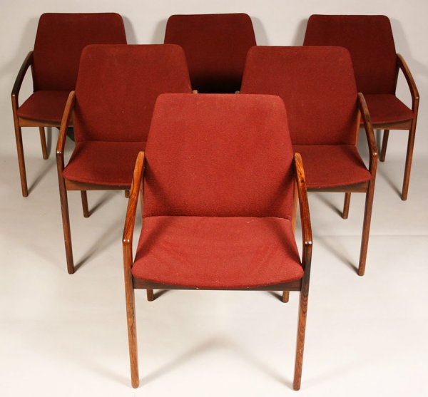 Danish Modern teak dining chairs: Set of six Danish design rosewood dining chairs branded "K.S., Made in Denmark" on bottom. Overall very good condition with minor abrasions, later upholstery. Each measures 32" Height x 21" Width x 22