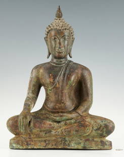 Southeast Asian Bronze Buddha: Southeast Asian, probably Thai,bronze figure of Buddha, seated in padmasana or lotus position, his hands in bhumisparsa ("earth touching") and dhyana mudra, with elongated earlobes, tightly curled