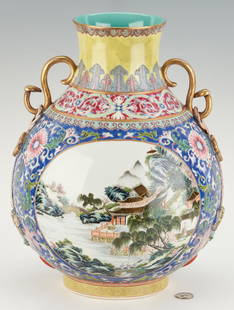 Famille Rose Vase with Serpent Handles: Chinese Famille Rose porcelain vase with gilt handles in the form of serpents, tassels, figural fish and auspicious symbols; slightly flared neck having a polychrome border decoration on yellow