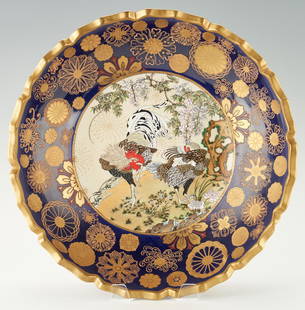 Large Japanese Satsuma Gosu Blue 18" Charger: Very large Edo or Meiji Satsuma Gosu Blue bowl or charger, the center enameled with decoration of an advancing rooster and coy hen in a landscape setting; blue enamel interior and exterior sides