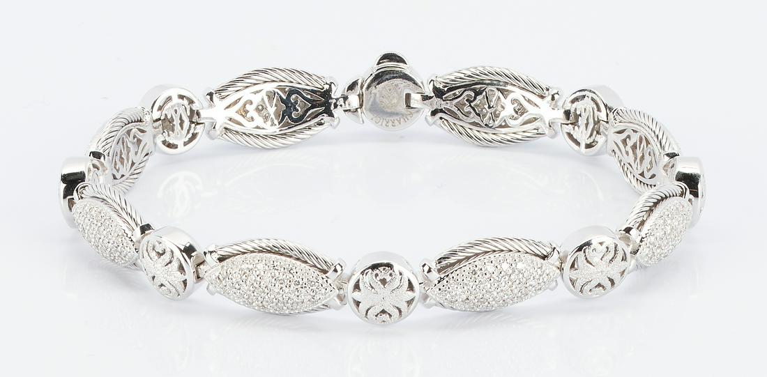 Charriol 18K Gold and Diamond Bracelet: Ladies 18K white gold bracelet designed by Philippe Charriol featuring 240 single cut diamonds approximately 1.20 carats, Clarity-SI1, Color-H. The bracelet is marked "750" and "Charriol". The bracele