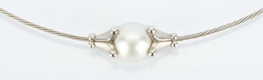 18K Morelli Necklace with Tahitian Pearl: Ladies 18K white gold necklace designed by Morelli featuring a Tahitian South Sea Pearl approximately 10.8mm well rounded with no spotting or pitting. The necklace is marked "750" and "Morelli". The n