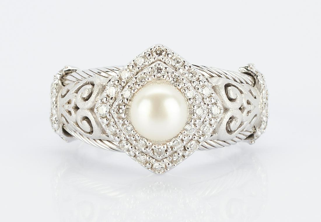 Charriol 18K Pearl and Diamond Ring: Ladies 18K white gold ring designed by Philippe Charriol featuring a cultured pearl approximately 5.5mm, accented by 38 round brilliant diamonds approximately 0.19 carats, Clarity-VS1, Color-G. The ri