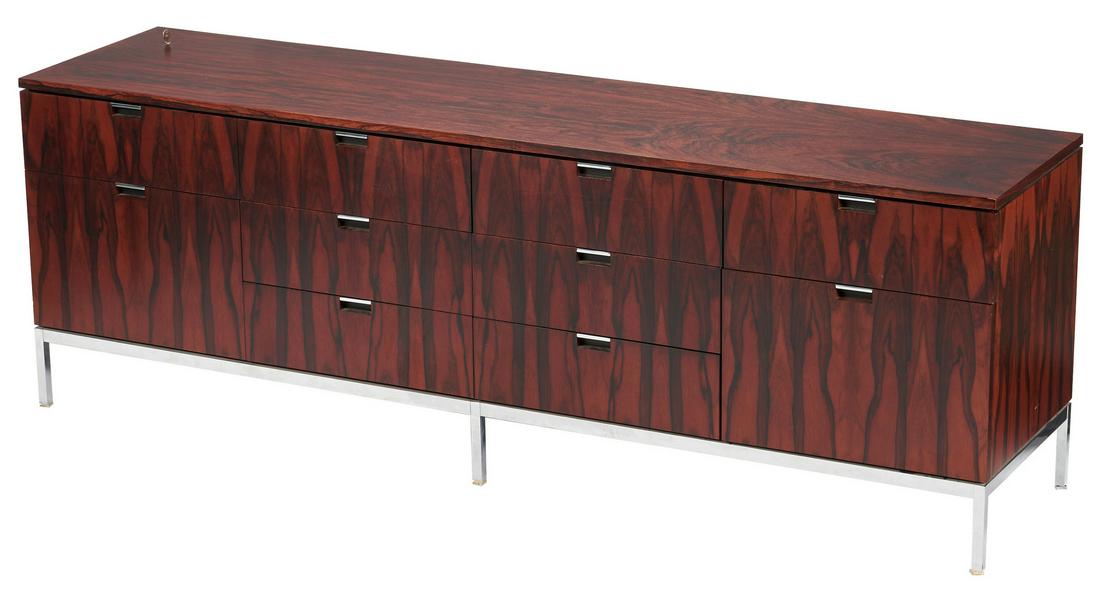 Knoll Rosewood Credenza or Sideboard, wood top: Knoll executive credenza or cabinet, rectangular form having ten fitted locking drawers with highly figured rosewood veneers, inset aluminum hardware, and steel hardware, base and square tubular legs.