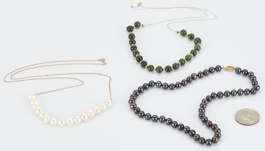 3 Ladies 14K Necklaces, Pearl & Jade: 3 Ladies 14K Necklaces, Pearl & Jade. 1st item: Ladies cultured Tahitian pearl necklace. The pearls average 6.8mm and are round. The clasp is marked "14K" and the necklace is 15" L. 24.2 g gross weigh