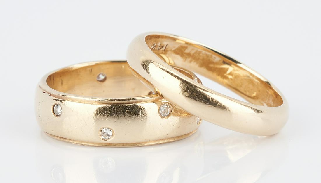 2 14K Yellow Gold Wedding Bands, 1 w/ Diamonds: 2 14K Yellow Gold Wedding Bands, 1 w/ Diamonds. 1st item: 14K yellow gold 6.5mm wedding band featuring 8 round brilliant diamonds approximately 0.16 carats, Clarity-SI1, Color-I. The ring is marked "1