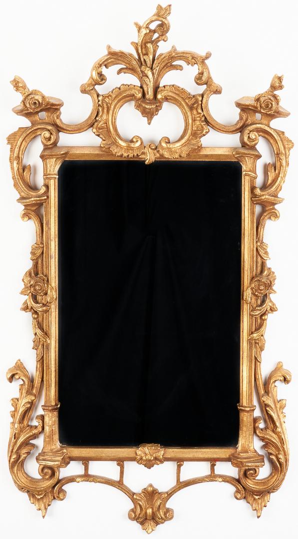 Rococo Style Giltwood Mirror by Uthmanor of Nashville: Rococo style giltwood mirror, benchmade by the Uthmanor Shop of Nashville. Scroll and foliate carved and pierced crest and frame enclosing a beveled rectangular mirror. Paper label en verso for "The U