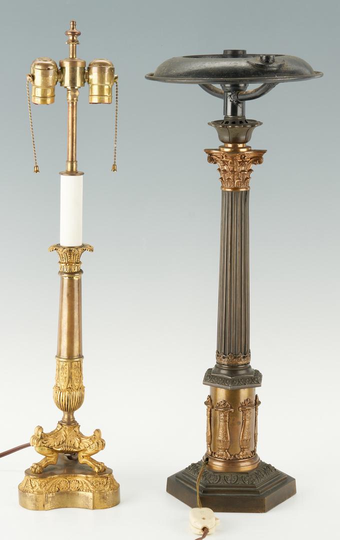 2 French Empire Style Candlestick Lamps inc. Ormolu: Two (2) French Empire or Late Classical style bronze candlestick lamps. 1st item: Patinated bronze Corinthian column style lamp with an octagonal base, converted from oil lamp and wired for electricit