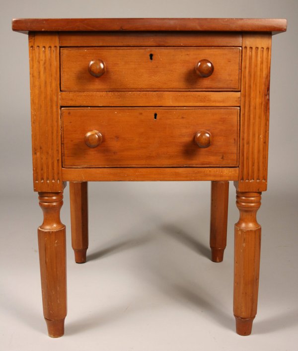 Cherry two drawer stand/work table: Cherry two drawer stand or work table, square top over two drawers flanked by fluted pilasters, drawers with nailed construction and round wood knobs. On four faceted hexagonal legs. Unusually deep fo