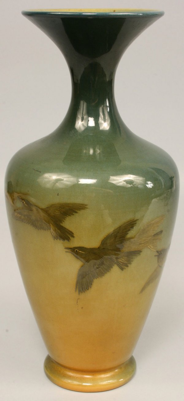 Rookwood vase, Kataro Shirayamadani: Rookwood Standard glaze or transitional Iris glaze scenic vase, depicting four birds in flight with blue green to yellow glaze color, marks for Kataro Shirayamadani, 1893. Marks include the Rookwood l