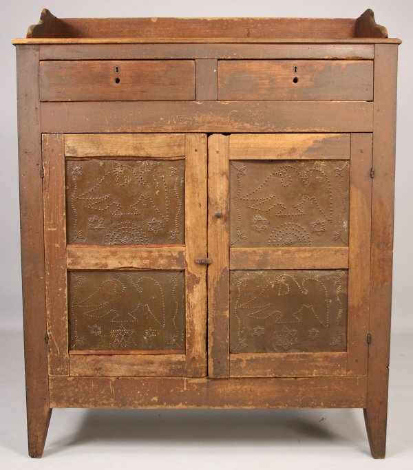 Middle TN pie safe with eagle tins: Middle Tennessee pie safe with eagle tins, cherry primary with poplar secondary, old red/brown paint. Consisting of a shaped gallery with old square nails over two dovetailed drawers above two punched