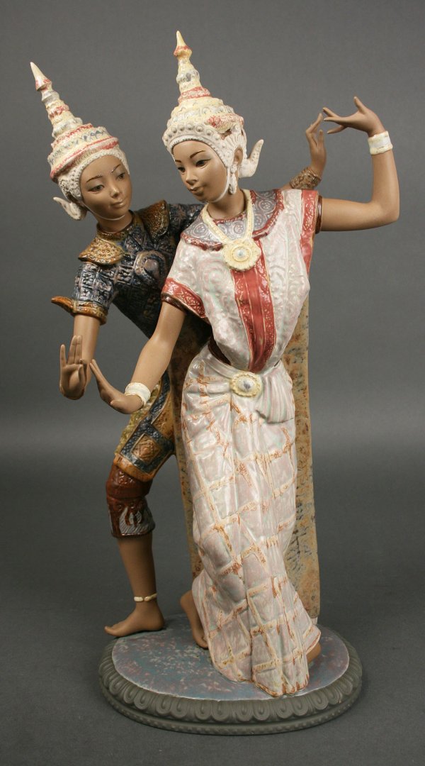 Lladro Balinese Dancers: Large Porcelain Lladro of Two Young Balinese or Polynesian Dancers. Marked "Lladro, made in Spain" and imprinted with "B-6MY" and "SV". Excellent condition. Measures 21 1/4" H x 6 3/4" D.