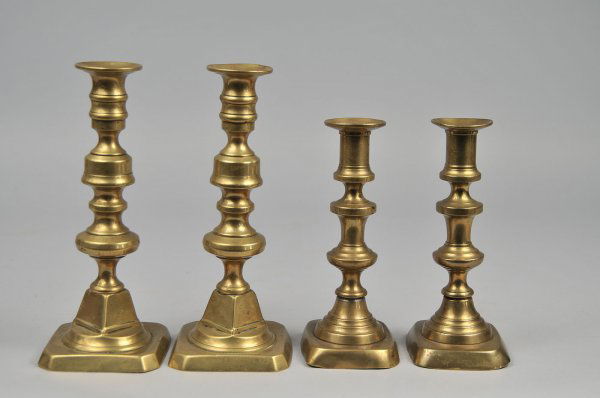 Two Pairs Brass Candlesticks: Two pairs of brass candlesticks. Most likely English. Base to one slightly dented. 19th century. Provenance: From a private Georgia collection.