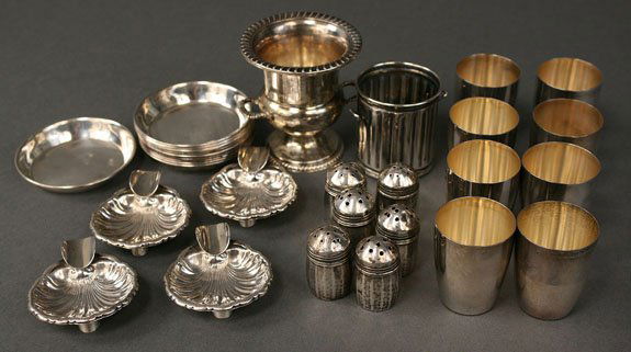 Assorted small silver hollowware: 30 pieces small sterling silver hollowware. Consisting of eight small plain shot glasses, each 1 3/4" tall; Ten small butter pats with engraved linear design, some monogrammed LML, 2 1/2" diameter; fo