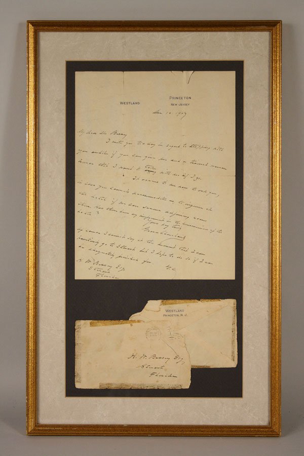 Grover Cleveland letter and envelope, framed: Grover Cleveland signed hand written letter, dated December 10, 1907 to H. N. Bassey Esq. regarding accomodations for an impending visit. Black ink written on stationary marked "Westland, Princeton, N