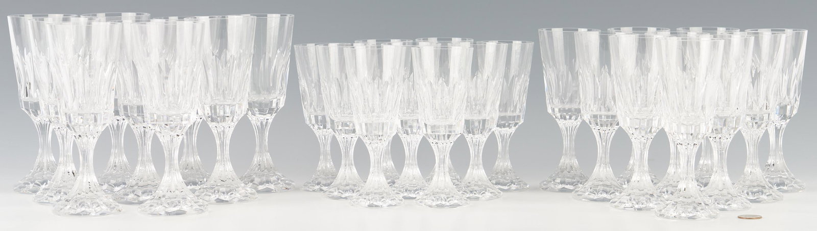 28 Pcs. Baccarat D'Assas Pattern Stemware: Set of twenty-eight (28) Baccarat D'Assas pattern stemware, including nine (9) water glasses, ten (10) claret wine glasses, and nine (9) white wine glasses. All with the Baccarat etched mark to the un