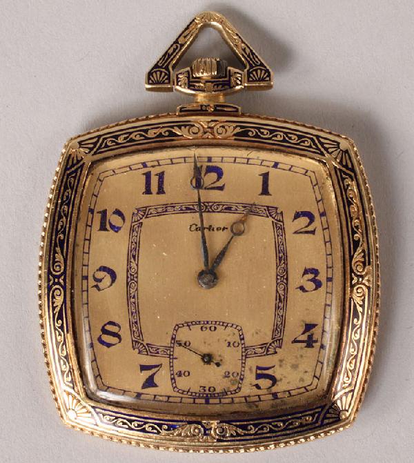 18K Gold and Enamel Cartier Pendant Watch: 18K gold and enamel pendant watch, marked Cartier on face. Gilt and cobalt enameled decorated border enclosing a gold face with blue enameled decoration. Arabic numerals and seconds hand. Zenith movem