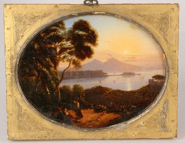 Continental School landscape, reverse painted on g: Oval eglomise panel with landscape depicting town and two peaks (one possibly a volcano) in the background, trees and figures in the foreground. Giltwood frame with incised floral decoration on the sp