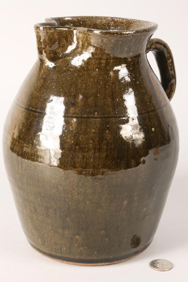 Large Lanier Meaders Pitcher: Larger Lanier Meaders brown drip glazed pottery pitcher signed "Lanier Meaders" on the bottom. 9 3/4" H. Excellent condition. Georgia. 20th century. Provenance: Georgia estate.