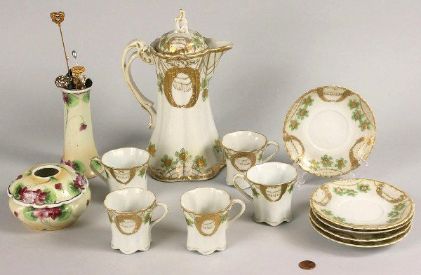 Lot of 13 pcs Nippon Porcelain: Grouping of Nippon Porcelain Items, 13 items. 1st item - Nippon porcelain coffee set, 5 cups (2 1/2" H) with saucers (5" Diameter), and pot (9 1/4" H), with gold garland and roses, green leaves. 12th 