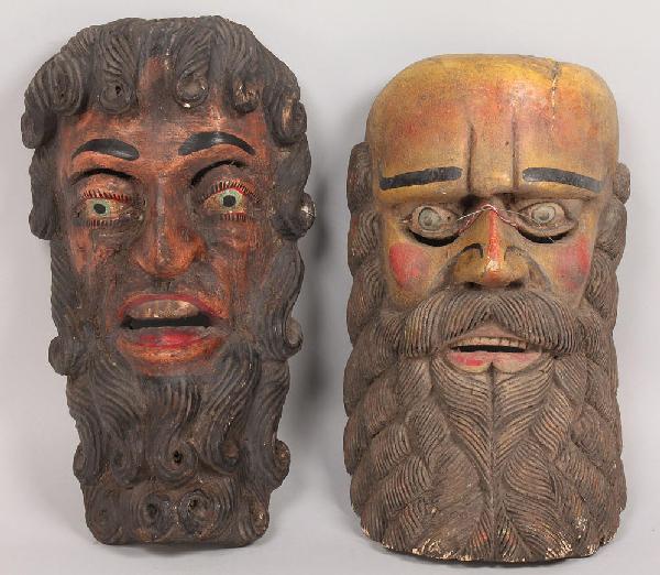 Pr Mexican Folk Art Moor masks, yellow and pink b: Mexican Folk Art mask, bearded men. 1st item - Polychrome painted yellow face with blue eyes and red cheeks, long black beard. (14" H). 2nd item -Polychrome painted man with pink face, green eyes and