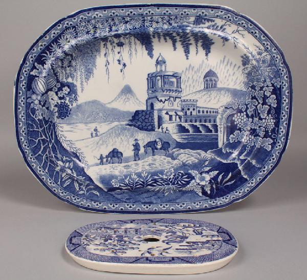 Ironstone Transfer Blue & White, Platter and Strai: 1st item: Ironstone transfer ware platter in blue & white with castle and men with donkeys in foreground, in very good condition. 12 3/4" H X 17" W. late 19th century. 2nd item: Blue Willow transfer w