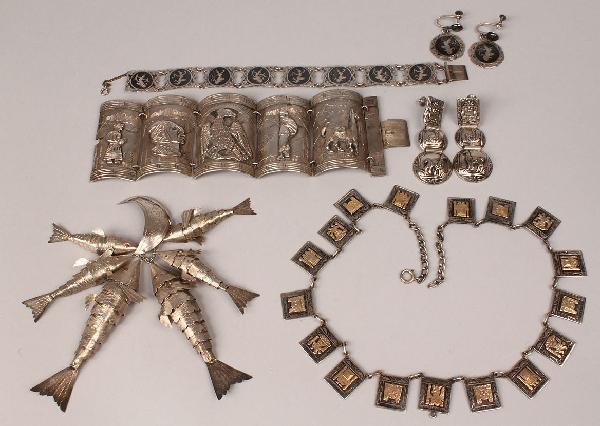 Siam and Incan Sterling Jewelry: Siam and Incan Sterling Jewelry. 1st item - Siam sterling jewelry set which includes a seventeen shield necklace (16" L) engraved with faces and dancing characters, an eight shield bracelet (7 1/4" L)