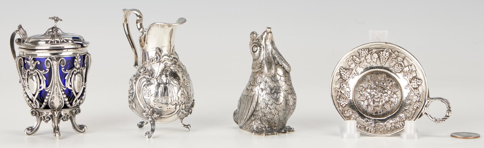 4 European Silver Items, incl. Wine Taster & Figural: 1st item: English George III sterling silver footed creamer with raised cartouche decoration to the body enclosing repousse designs of a female with children, raised on curved legs and shell feet. Par