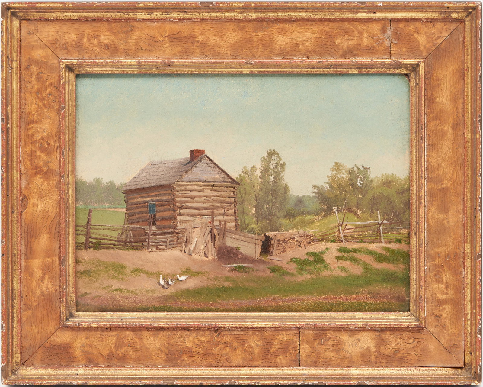 American School Oil Landscape with Log Cabin: American School oil on board painting, laid on canvas, depicting a log cabin with a wooden fence and geese against a group of trees beneath a blue sky. Unsigned. Includes a laminated newspaper fragmen