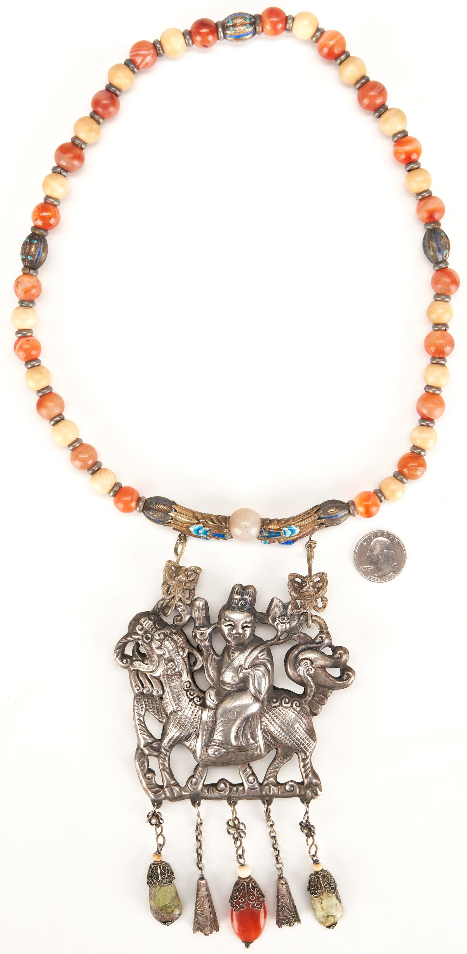 Chinese Silver Pendant & Necklace, Carnelian &: Chinese silver pendant, hollow, depicting a figure astride a dragon-like horse or Longma, suspended from beads of carnelian, cloisonne, and bone, with silver filigree and hardstone drops. Signed en ve