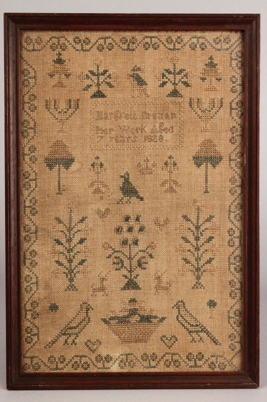 1828 Needlework sampler, Margrett Brenan: Framed 1828 Needlework Sampler. Silk on linen needlework sampler, signed "Margrett Brenan/her work aged/7 years 1828". Stylized floral border with stitched motifs including birds, reindeer, hearts, ca