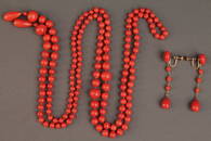 490: Red coral necklace, 54", and earrings