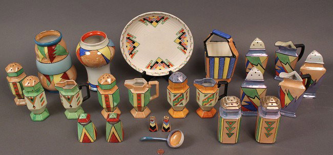 Japanese Art Deco Porcelain Service, 23 pieces: Assembled lot of Art Deco Japanese porcelain in multicolor lustre, matte and semi-matte glazes. One planter, one pair of salt and pepper shakers, and one plate, one pair of miniature salt and pepper s