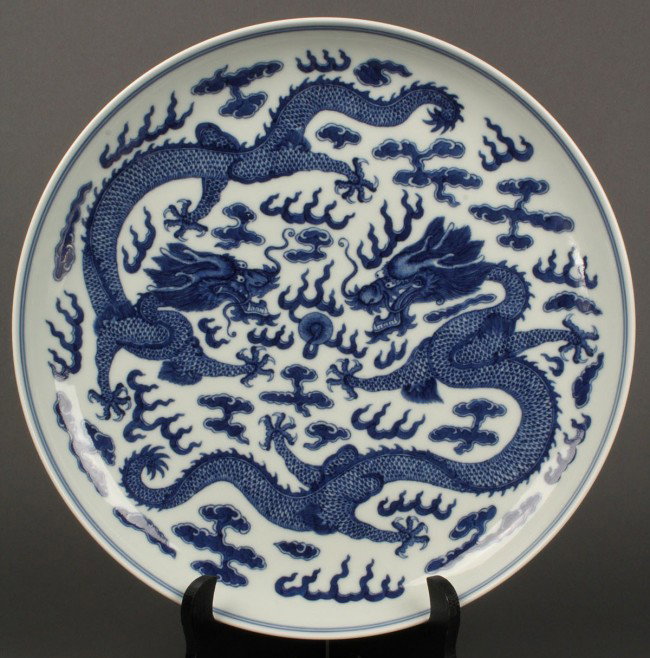 Large Chinese Blue & White Porcelain Charger, Guang: Large blue and white porcelain charger with central decoration of two dragons chasing the pearl of wisdom, same design repeated on underside of rim. Blue six character Guangxu mark on underside. Excel