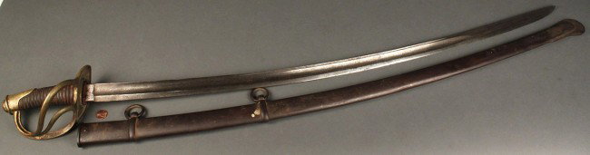 Civil War Cavalry Trooper's Sword: US Civil War Cavalry Trooper's Sword, Model 1840, maker's mark "PDL" in oval cartouche on blade near handle, for Peter D. Luneschloss. Blade made of Solingen Steel, brass hand guard and leather-covere