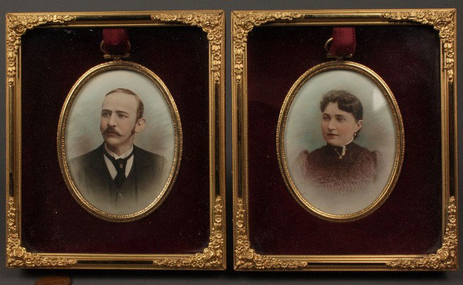 Pair of Tennessee Fort family portraits by Calvert: Miniature portraits, tinted photographs on paper, of Joel Battle Fort and wife Sallie McKay Fort. Both signed Calvert. Simple gilded oval frames, housed in velvet lined shadowbox frames. Condition: ba