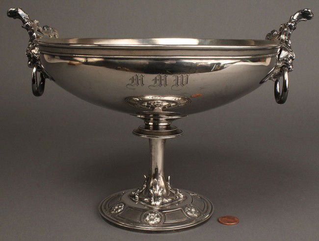 American Silver compote, John Cann: American coin or sterling silver compote on foliage figural pedestal with applied metal silver plated animal handles with rings. Monogrammed "MMW". Marks on base. Note: John Cann, a principle in the f