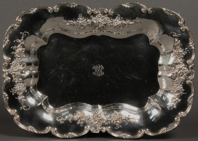 Sterling Silver Tray, Charles Warren retail mark: Rectangular shaped sterling silver tray, scalloped edges with applied floral spray decoration, Charles W. Warren & Co. Detroit, Mich. retailer mark. Monogrammed BRH to center. Overall very good condit