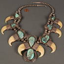 165: Native American silver and turquoise claw necklace